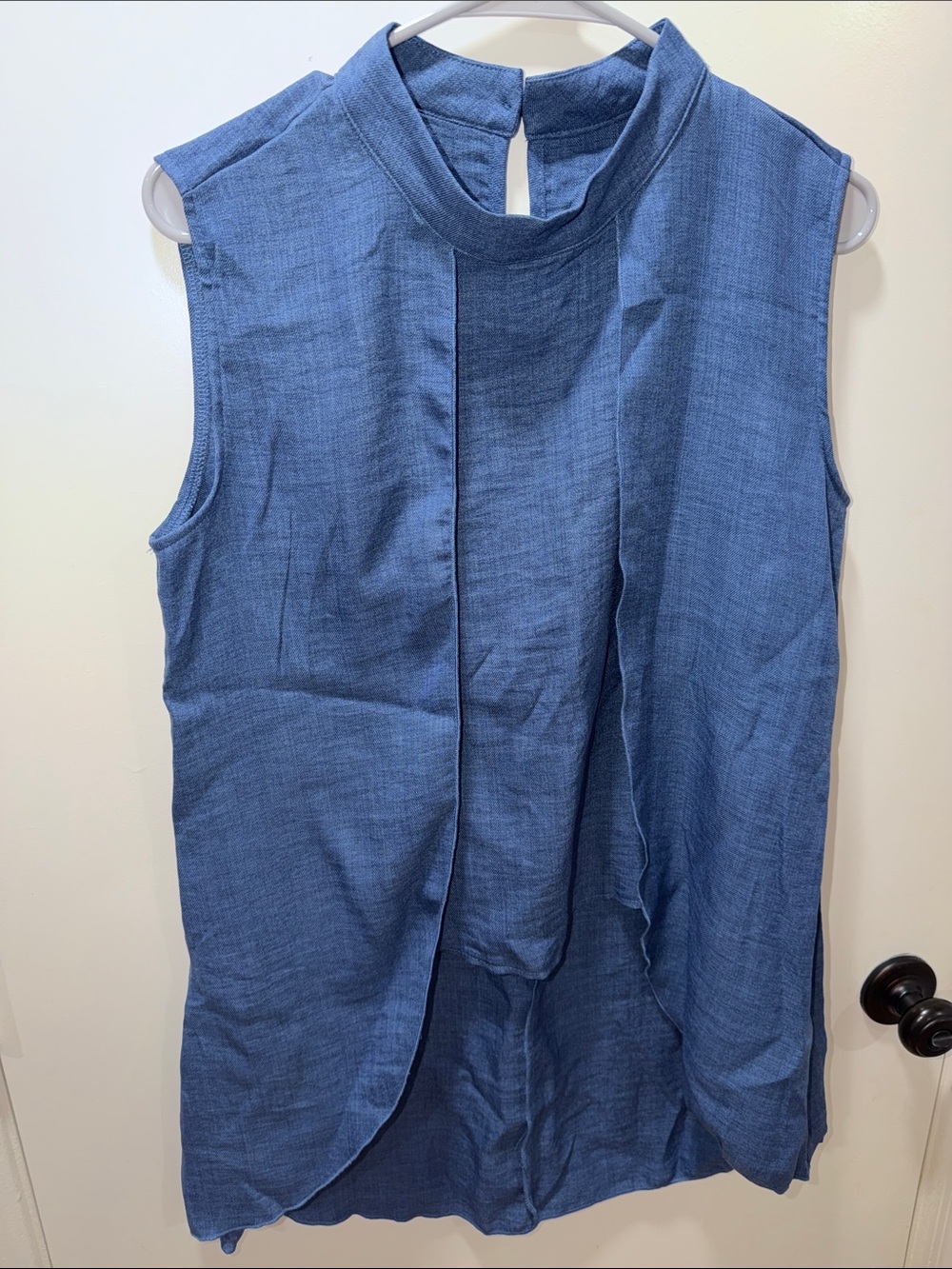 Sleeveless Blue Mock-Neck Blouse